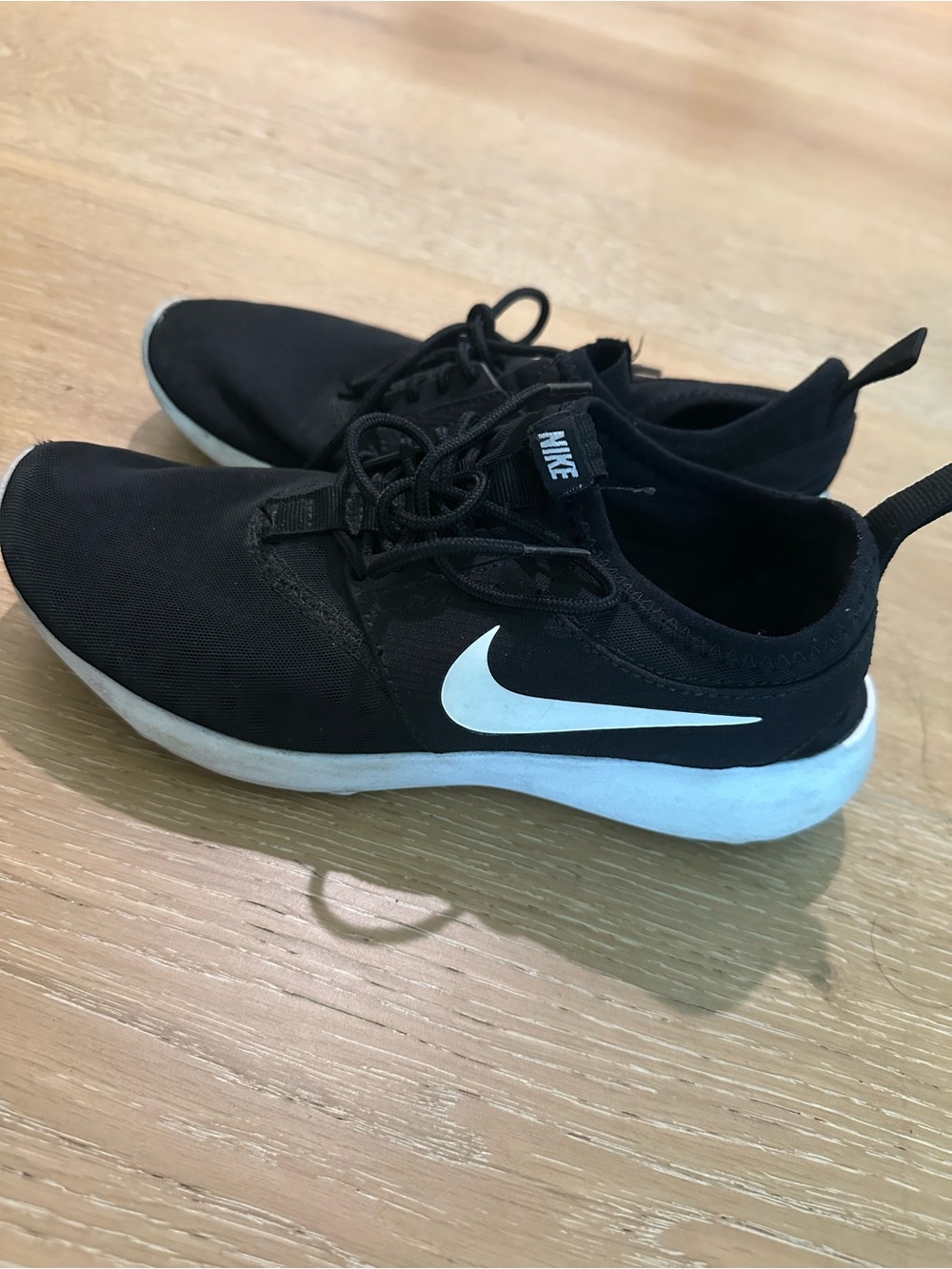 Nike Kids Black Sneakers with White Swoosh